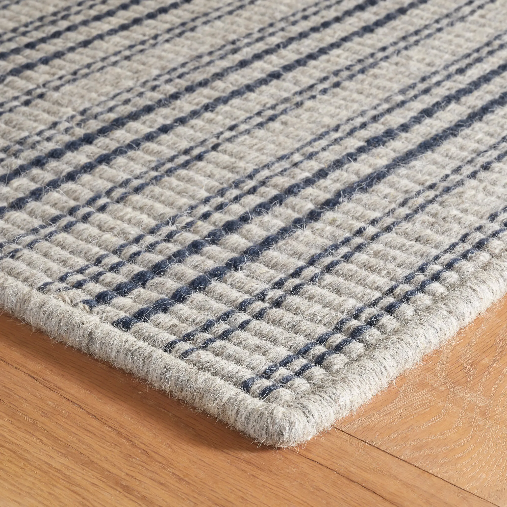 Warren Ticking Navy Woven Wool Custom Rug Swatch With Attached Rug Pad